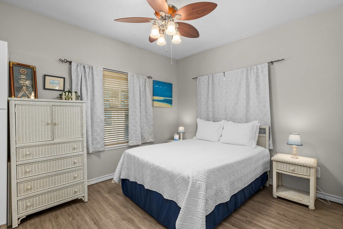 Primary bedroom with queen bed
